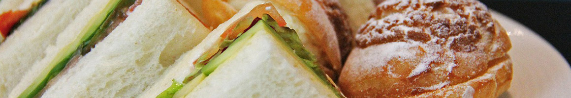 Eating Sandwich Vietnamese at Freshroll Vietnamese Rolls & Bowls restaurant in San Francisco, CA.